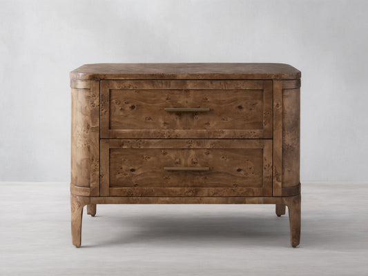 Front view of the Mogadore Nightstand, crafted from book-matched mappa burl wood with two drawers and brass handles.