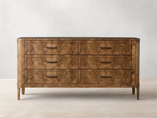Front view of the golden-brown Mappa burl wood Mogadore Six-Drawer Dresser with six drawers and antiqued brass-finished hardware.