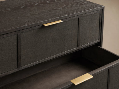 Olina Six-Drawer Dresser in dark oak with textured raffia fronts, three drawers slightly open, brass pulls visible.