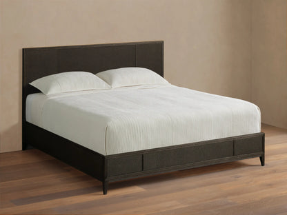 Front view of the dark brown Olina Bed, featuring a textured raffia headboard and footboard, with white bedding.