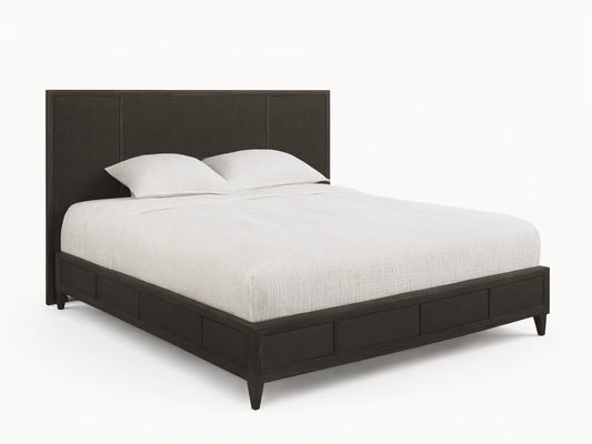 Front view of the dark brown Olina Bed, featuring a textured raffia headboard and footboard, with white bedding.