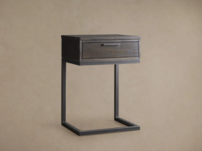 Palmer Storage Nightstand with a dark wood finish and a single drawer. Features a sleek, black iron frame in a Parsons style.