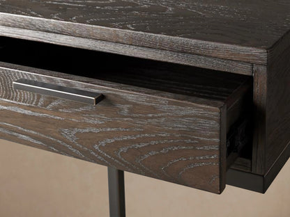 Palmer Storage Nightstand with dark wood finish, single drawer, and sleek Parsons-style iron frame on wooden floor.
