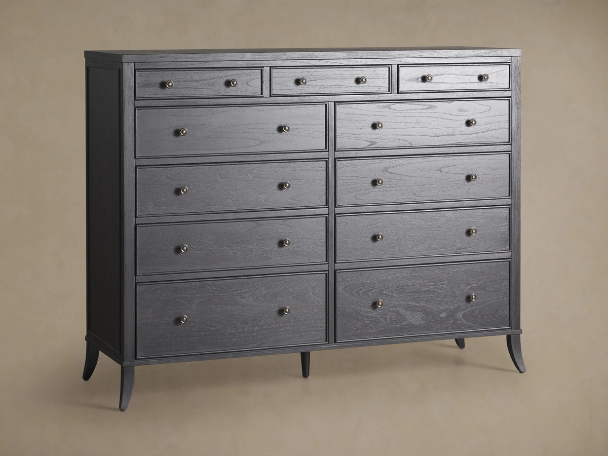 Pearson Eleven-Drawer Dresser in dark wood finish with curved legs, featuring three small top drawers and eight larger ones below, each with round knobs.