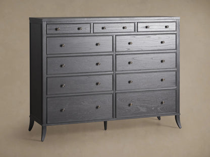Pearson Eleven-Drawer Dresser in dark wood finish with curved legs, featuring three small top drawers and eight larger ones below, each with round knobs.