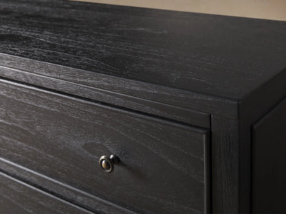 Pearson Wide Six-Drawer Dresser in dark gray mindi wood, with six framed drawers and dark round knobs, against a beige wall.