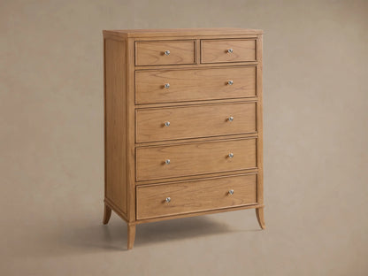 Close-up of the light brown Pearson Six-Drawer Dresser with two open drawers, showing carved molding and silver-tone knobs.