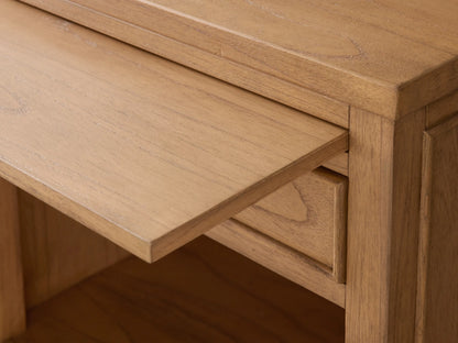 Front view of the natural Mindi wood Pearson Nightstand, featuring a single drawer with a round pull, pull-out tray, and open storage.