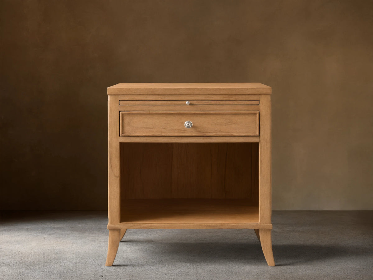 Front view of the natural wood Pearson Nightstand with one drawer, an open shelf, and a pull-out tray.