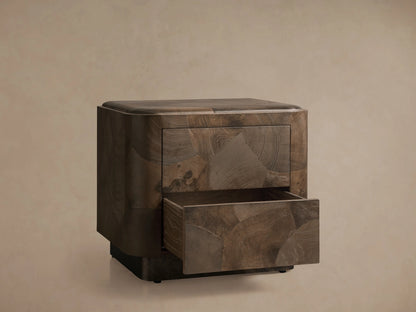 Polanco Nightstand with a drawer partially open, showcasing its handcrafted oyster-cut salvaged ash with unique textures and a rich patina.
