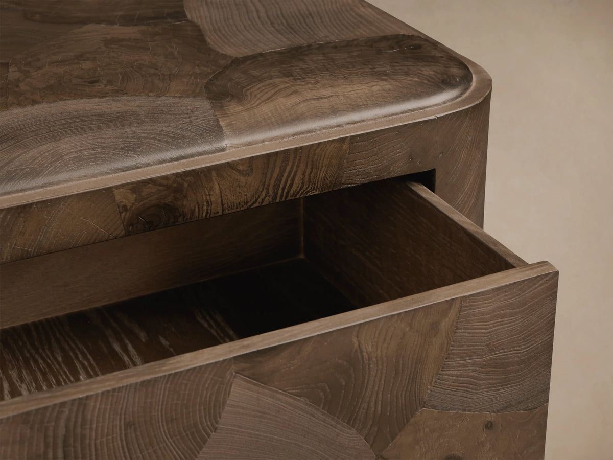 Polanco Nightstand in dark wood with an open drawer, showcasing the handcrafted oyster-cut pattern and natural grain texture.