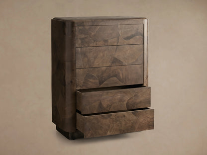 Polanco Five-Drawer Dresser made of dark wood with visible grain patterns. Three drawers closed, two slightly open, on a textured base.