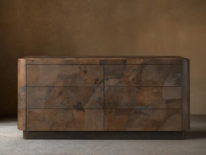 Polanco Six-Drawer Dresser made from salvaged ash wood with visible graining, cracks, and patina. Features a smooth, rectangular design.