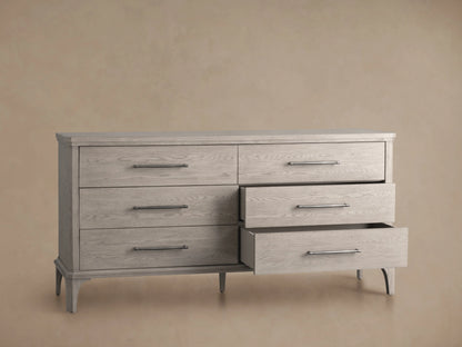 St. Martin Six-Drawer Dresser in Haze finish, showing the top corner and two drawers with pewter-finished horizontal handle.