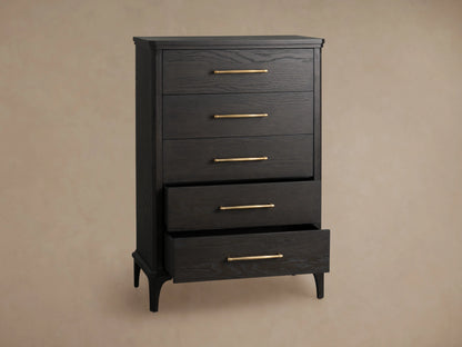 St. Martin Five-Drawer Dresser in dark oak with a Smoke finish, featuring brass-finished handles, against a beige wall.