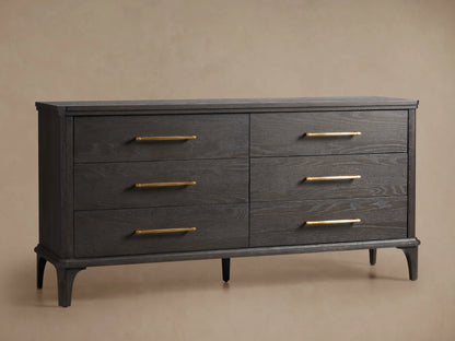St. Martin Six-Drawer Dresser in smoke-finished oak, six drawers with brass-finished bar pulls, front view against a light wall.