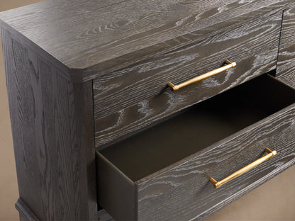 St. Martin Six-Drawer Dresser, dark gray finished oak, with six drawers & horizontal brass pulls. Sits on short, angled legs.