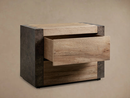 Telluride Nightstand made of oak wood with a drawer partially open. Features distressed steel sides with unique patterns.