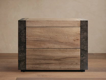 Telluride Nightstand made of solid oak and naturally oxidized steel, featuring two large drawers in a light wood finish.