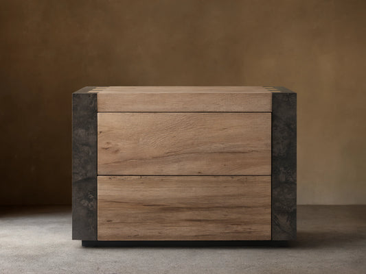 Telluride Nightstand made of solid oak and naturally oxidized steel, featuring two large drawers in a light wood finish.