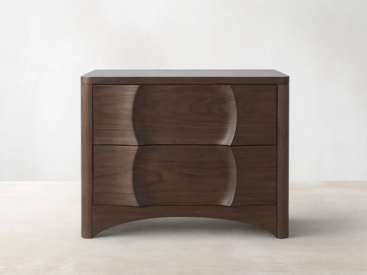 Dark walnut Westyn Nightstand with two drawers, featuring a unique carved wavy design across the drawer fronts.