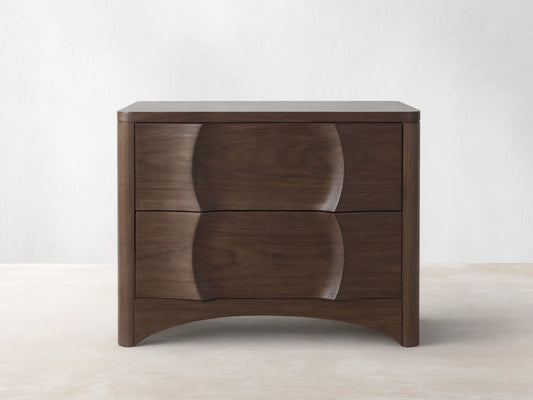 Dark walnut Westyn Nightstand with two drawers, featuring a unique carved wavy design across the drawer fronts.
