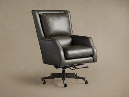 Dark gray Alex Leather Desk Chair, seen from the back-right, with a high back, detailed stitching, and a 5-star wheeled base.
