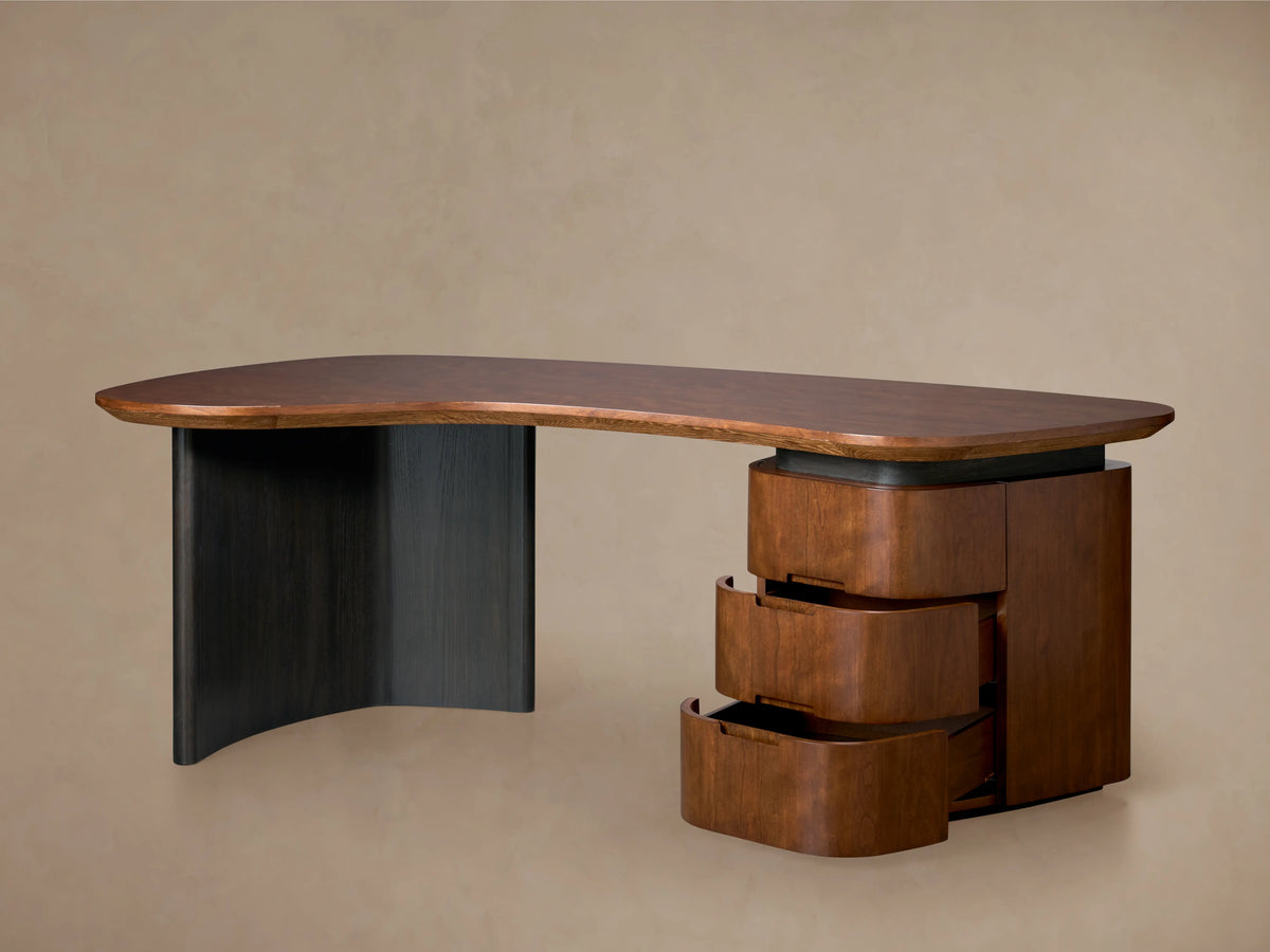 Berkley Executive Desk with a cherry wood top, inset handles, and soft-close drawers on an oak leg, finished in Ebony.