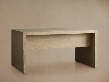 Bodhi Modular Desk made of solid white oak and veneers, featuring a rectangular design and wire-brushed finish on a beige background.