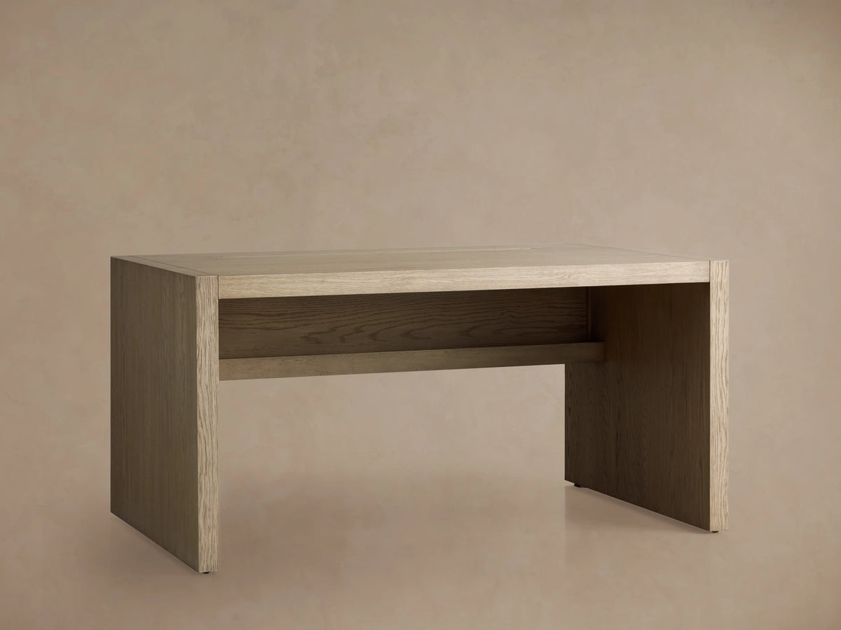 Bodhi Modular Desk made of solid white oak with wire-brushed finish, showing a rectangular shape and clean lines, on a neutral background.