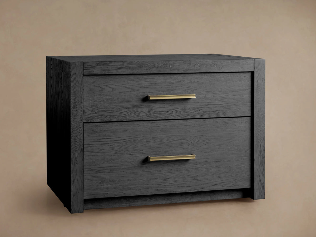 Bodhi Modular File in dark wire-brushed finish, featuring two drawers with brass pulls on a wooden floor background.