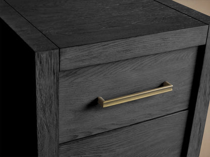 Bodhi Modular File in dark, wire-brushed oak finish with a brass drawer pull. Features visible wood grain and dovetail joinery.