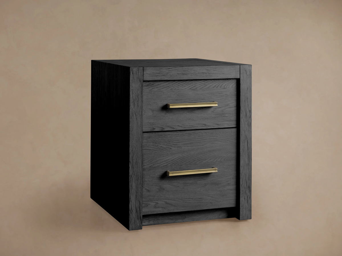 Alt text: Bodhi Modular File in a rich dark finish, featuring two drawers with sleek brass pulls. The file has a handcrafted appearance using solid white oak.