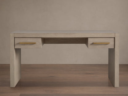 Bodhi Writing Desk, handcrafted light gray-brown wire-brushed white oak desk with two drawers and brass pulls, front view.