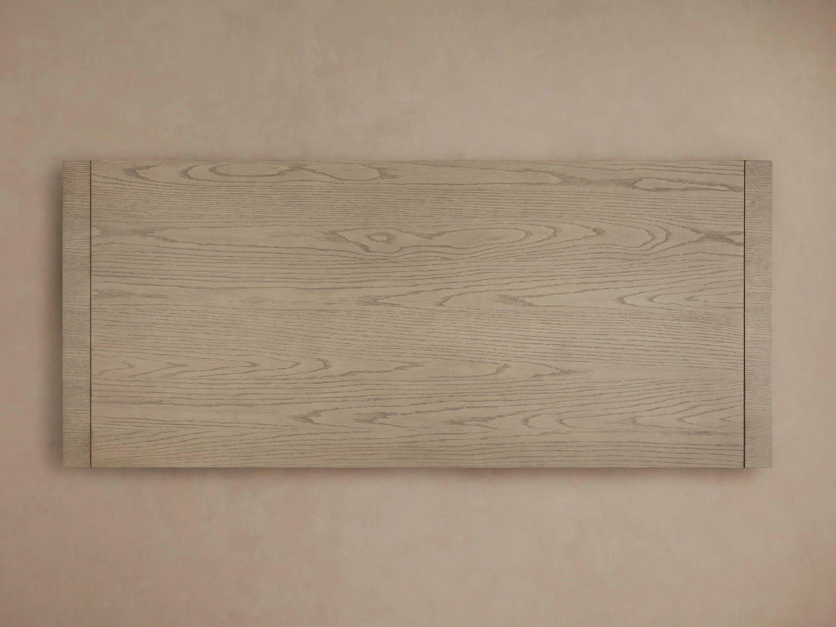 Rectangular Bodhi Writing Desk panel, light wire-brushed white oak with visible natural wood grain, seen from a top-down angle.