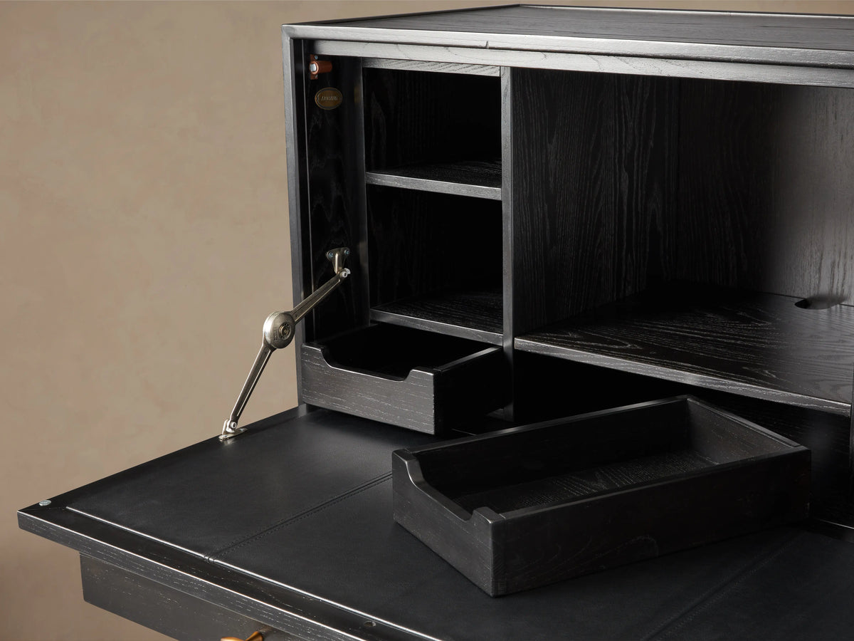 Brock Hideaway Desk with ash wood finish, open compartments, leather writing surface, and visible internal storage shelves.