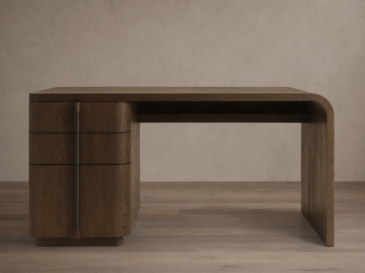 Front view of a dark brown wooden desk with three curved drawers on the left and a continuous tabletop and right leg.