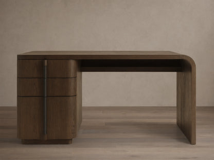 Front view of a dark brown wooden desk with three curved drawers on the left and a continuous tabletop and right leg.