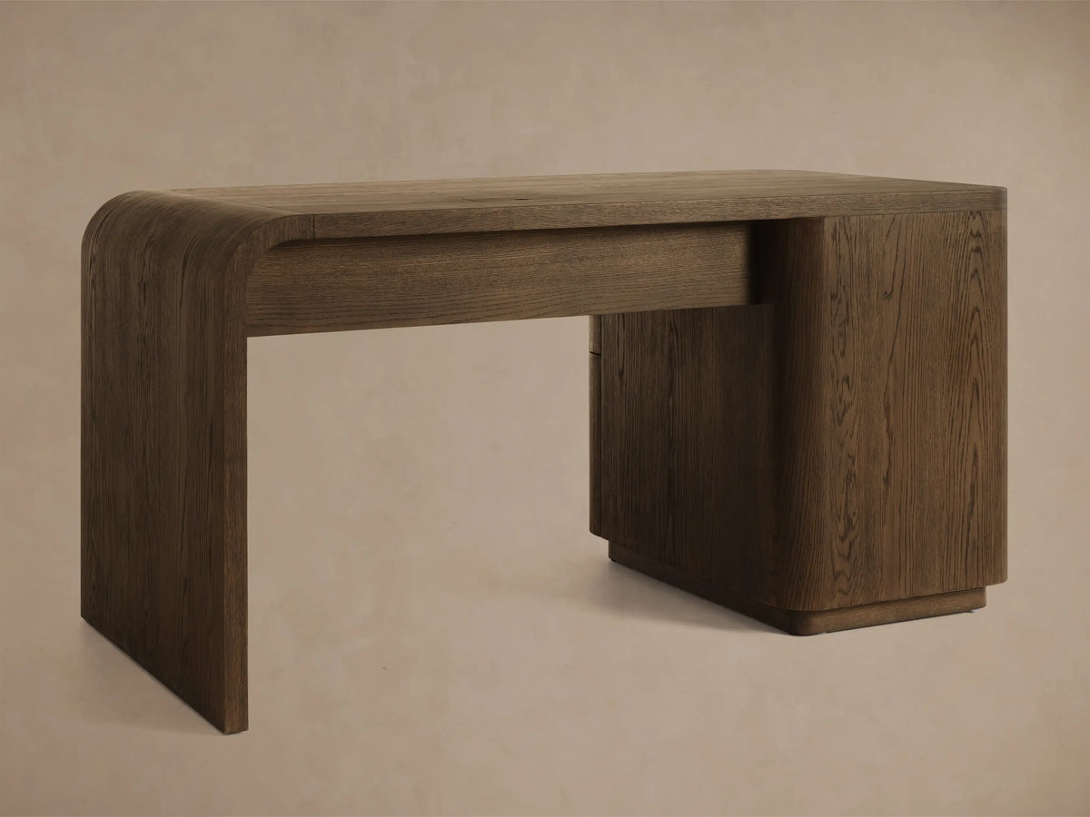 Close-up of a dark brown wooden cabinet with distinct grain, curved bottom edges, and a black vertical bar handle.