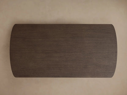 Front view of the dark brown Camonte Lift Desk, featuring a rectangular top with rounded corners and two ribbed pedestal legs.