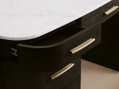 Front view of the dark oak finish Danny Executive Desk‚Ñ¢ with a white Carrara marble top, seven drawers, and brass-colored pulls.