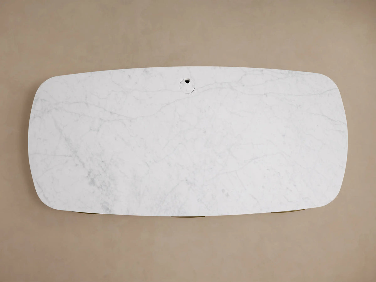 Front view of the dark brown Danny Executive Desk with a white marble top and curved side panels.