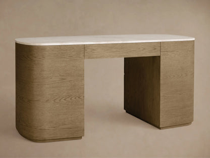 Close-up of the Danny Executive Desk‚Ñ¢. A partially open oak veneer drawer with a brass handle below an earth-toned royal cream marble top.