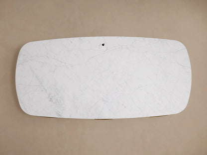 Front view of the natural oak veneer Danny Executive Desk, featuring a white Carrara marble top and curved left side.
