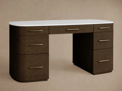 Front view of the dark brown Danny Executive Desk with a white marble top, seven drawers, and brass pulls.