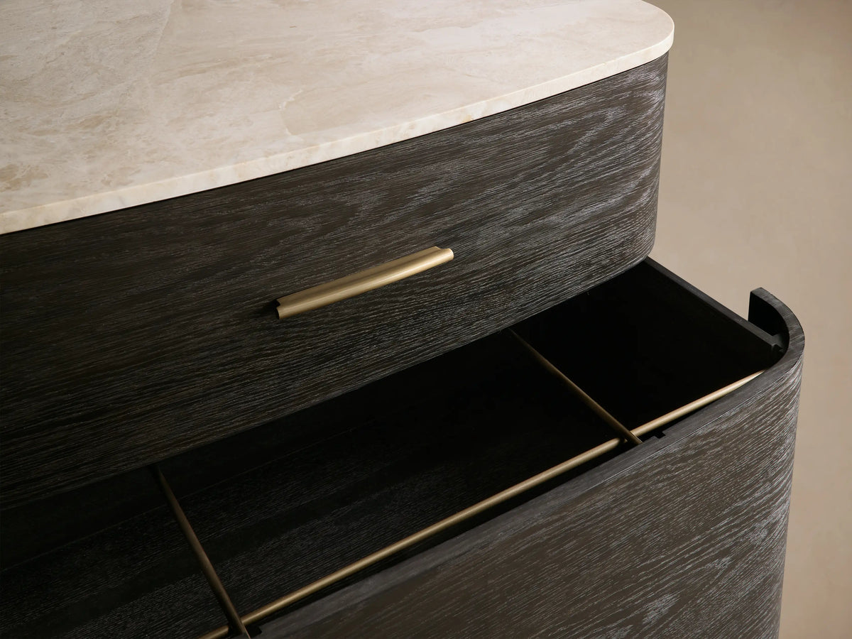 Front view of the Danny File Cabinet. Dark oak veneer body with rounded edges, two drawers, brass pulls, and a white Carrara marble top.