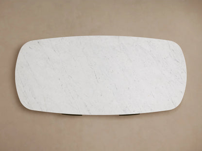 Overhead view of the Danny Writing Desk's white Carrara marble top, featuring rounded corners and subtle grey veining.