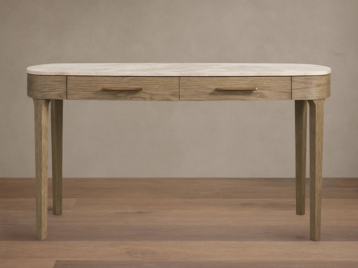 Danny Writing Desk with an oval white marble top, two fawn wood drawers with brass pulls, and four tapered legs.
