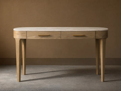 Danny Writing Desk with an oval white marble top, two fawn wood drawers with brass pulls, and four tapered legs.
