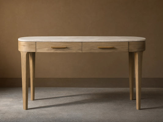 Danny Writing Desk with an oval white marble top, two fawn wood drawers with brass pulls, and four tapered legs.